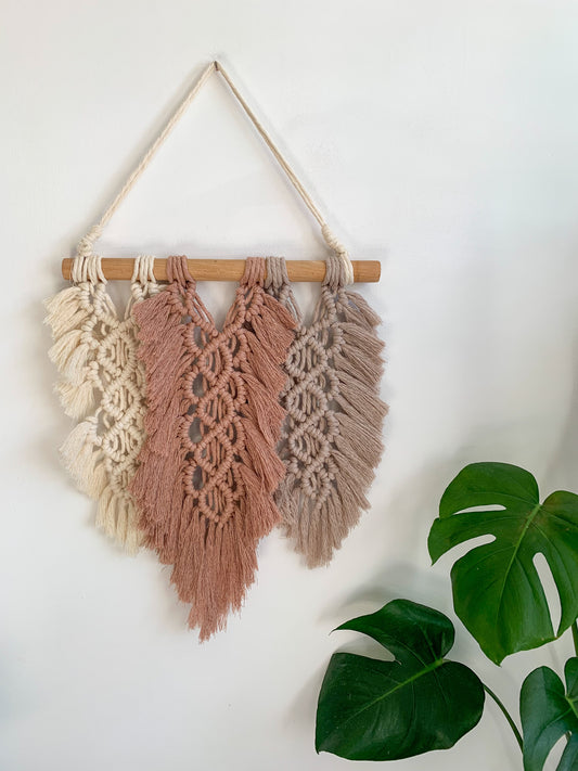 3 feather macrame wall hanging in natural white, latte and blush pink from Katy’sWhatKnots.com